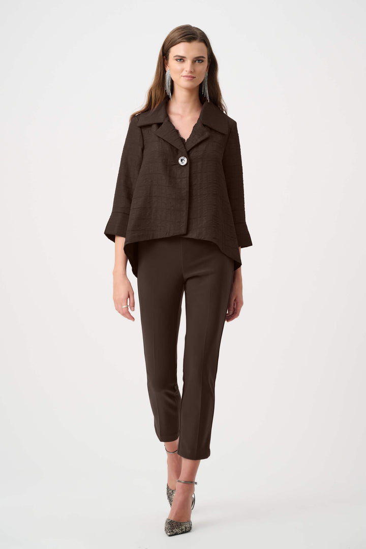 Joseph Ribkoff model wearing high-waisted, straight-leg cropped trousers in a deep brown color, paired with black pointed-toe heels, shown against a plain white studio background.