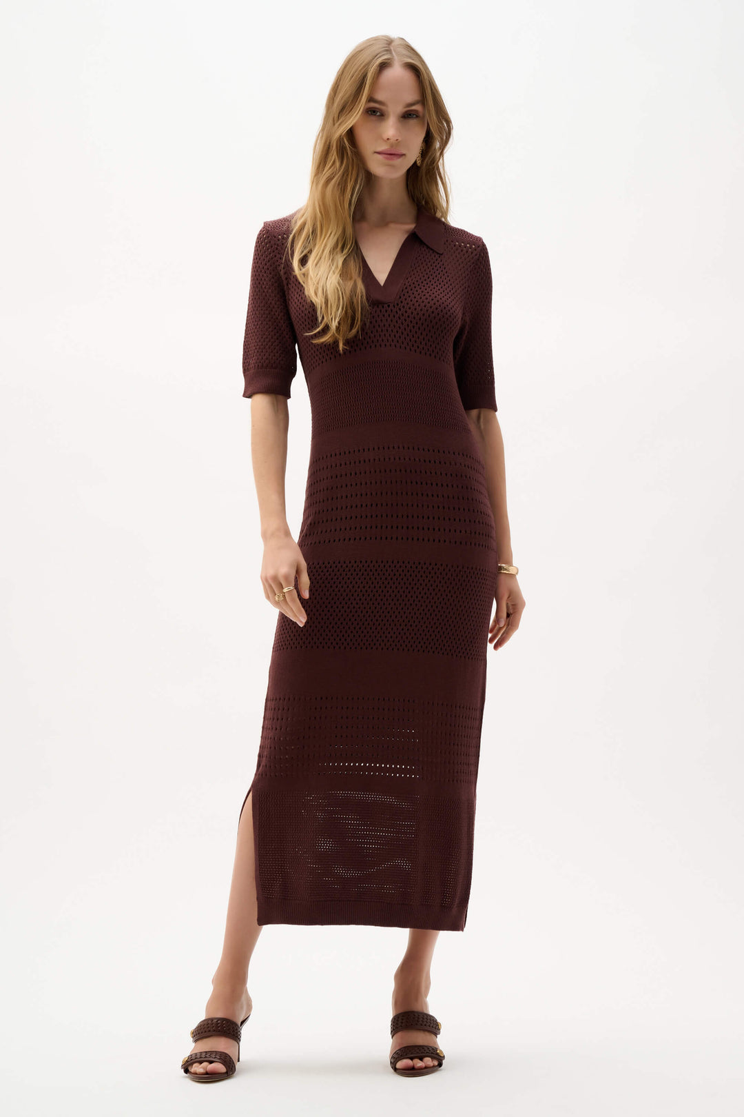 Joseph Ribkoff model in a brown knit sweater dress with V-neck, short sleeves, and midi length. On a studio background