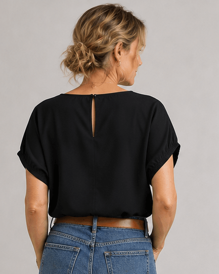 Black blouse top with back keyhole opening and short puff sleeves