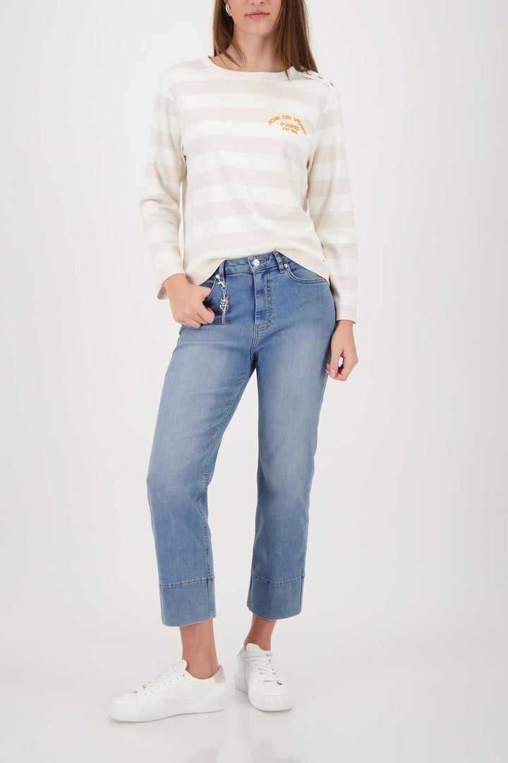 Women’s long-sleeve off-white jersey with light beige horizontal stripes and orange logo