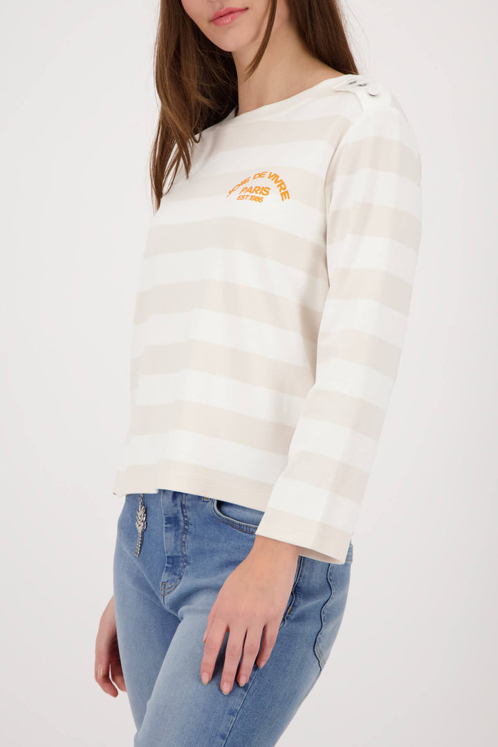 Women’s long-sleeve striped jersey top with crew neck and small orange chest logo