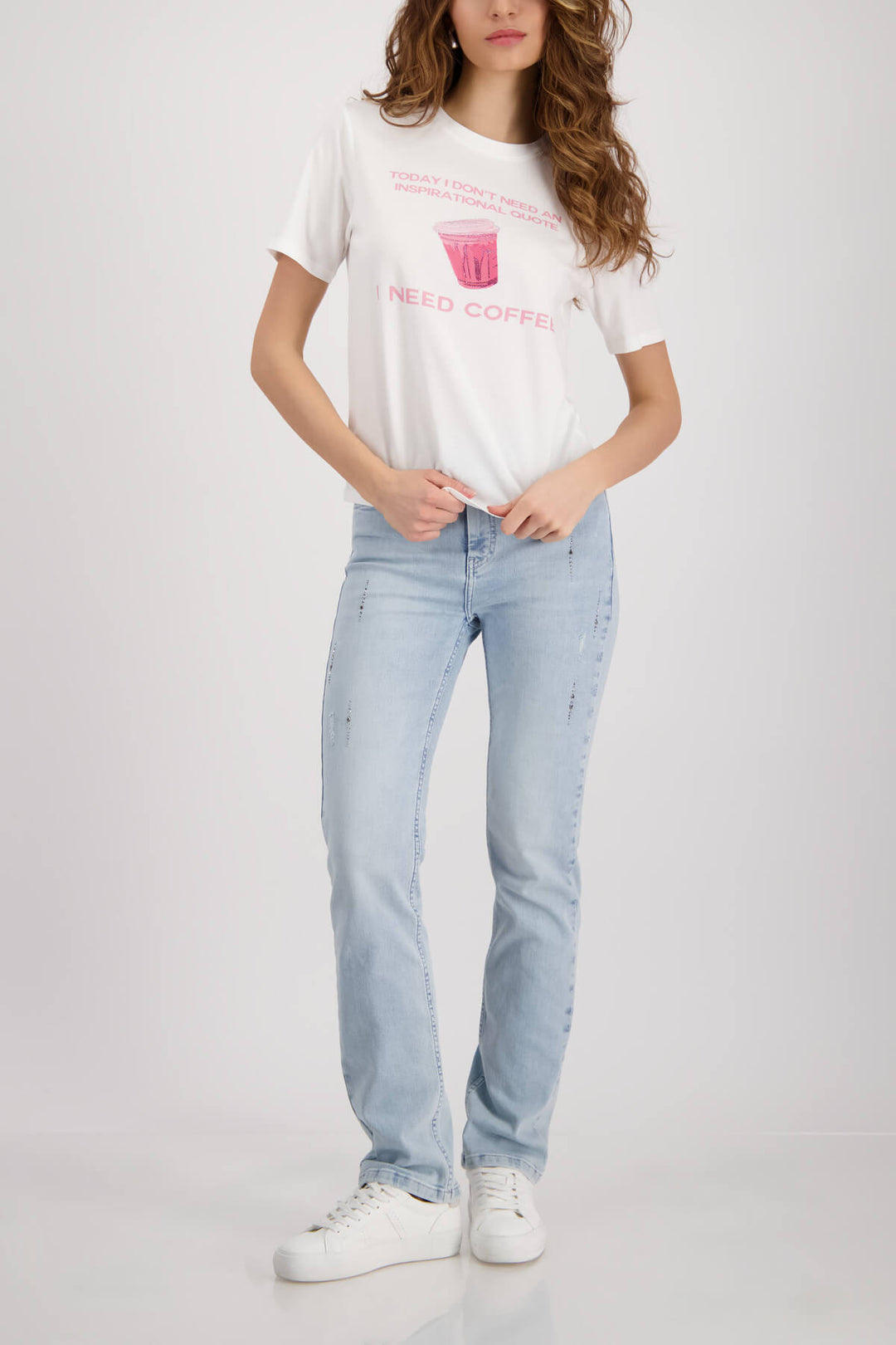 White crew-neck T-shirt with pink coffee cup graphic and slogan