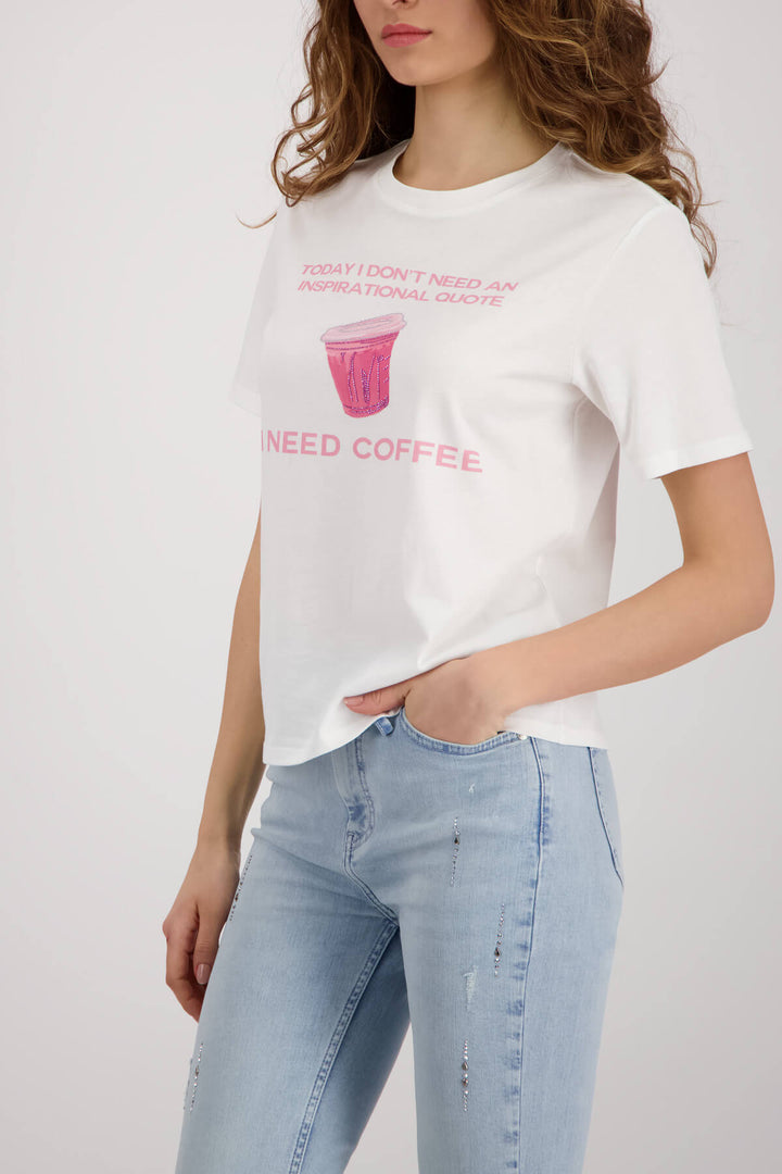 White short-sleeve T-shirt with pink coffee cup graphic and “I NEED COFFEE”