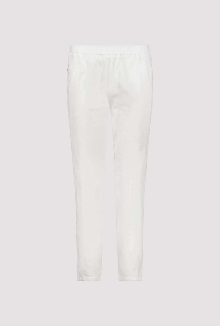 White jeggings pants, ankle-length, with front pockets and button closure