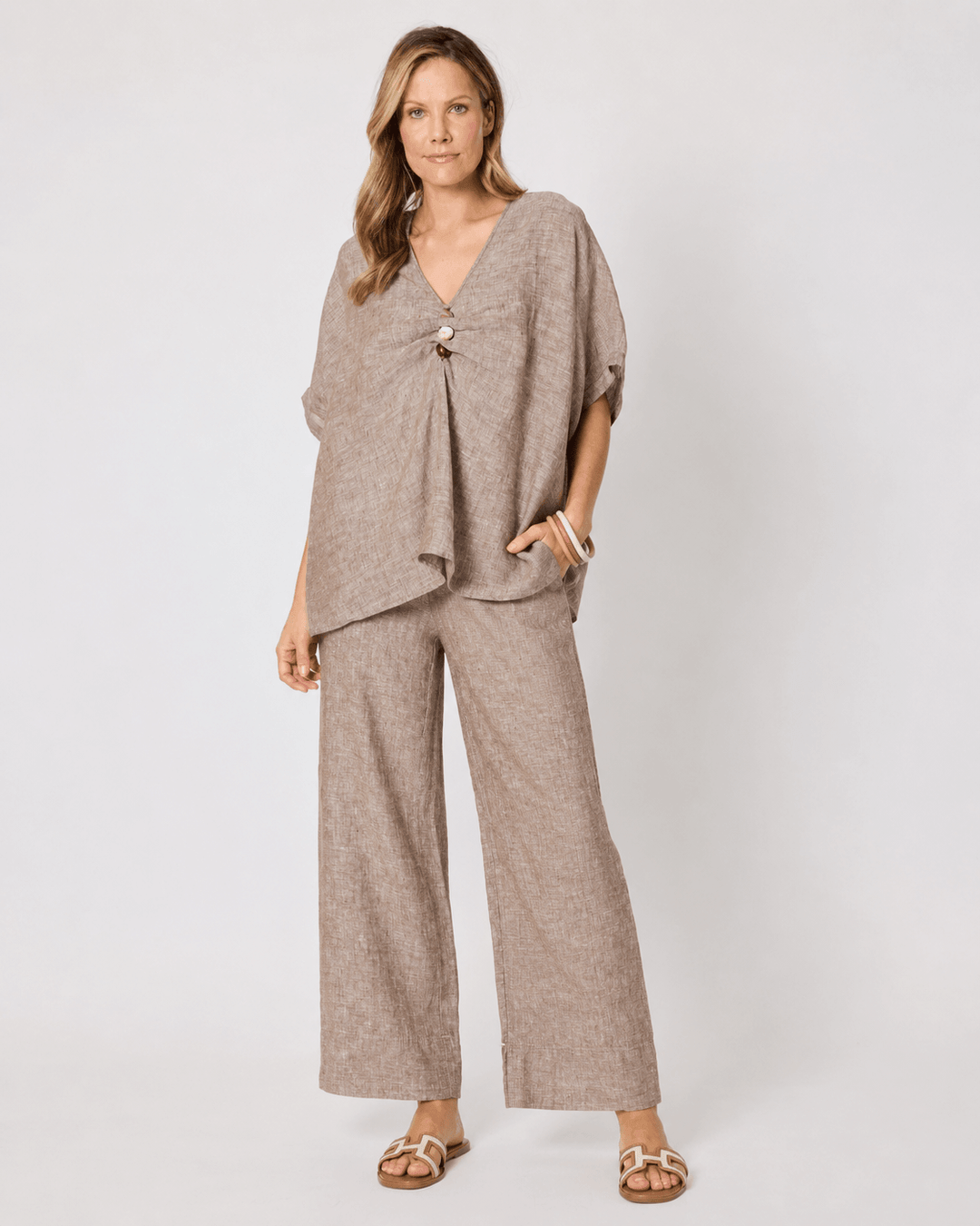 Mocha V-neck breeze top with short sleeves and front tie detail, relaxed drape