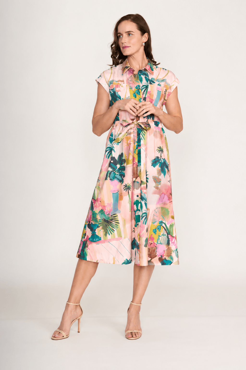 Pink floral sleeveless midi dress with tiered skirt and tie-back waist