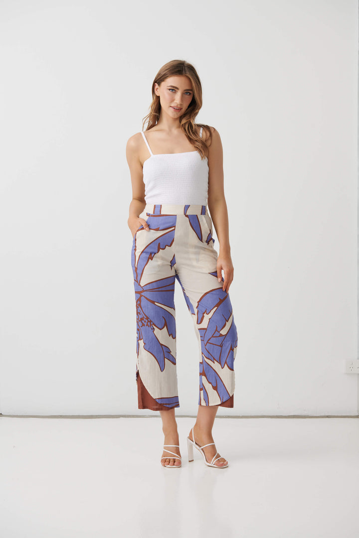 Cream mid-calf pants with lilac and blue palm print, straight leg