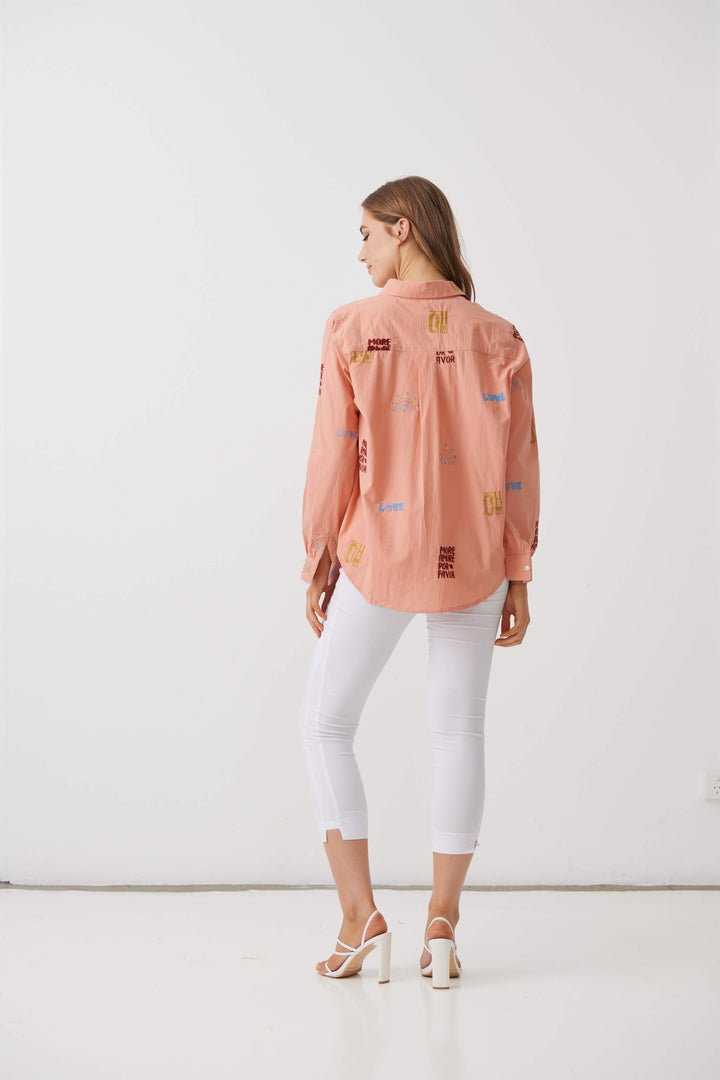Holmes &amp; Fallon More Amore peach shirt, back view with small graphic prints.