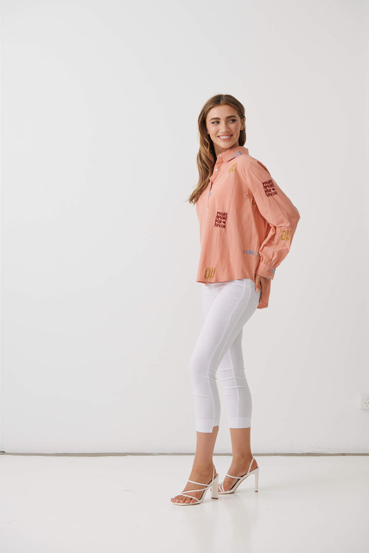 Holmes &amp; Fallon More Amore peach shirt, collared button-up, side view.