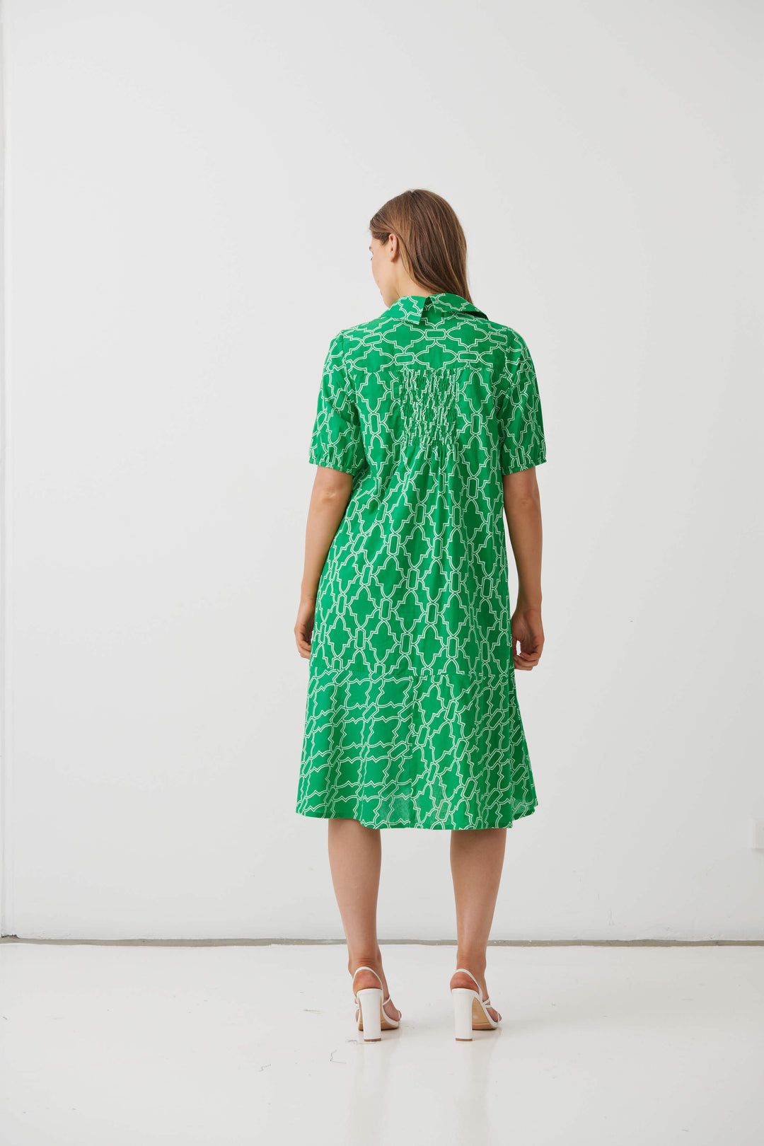 Green patterned midi dress with short sleeves, back view