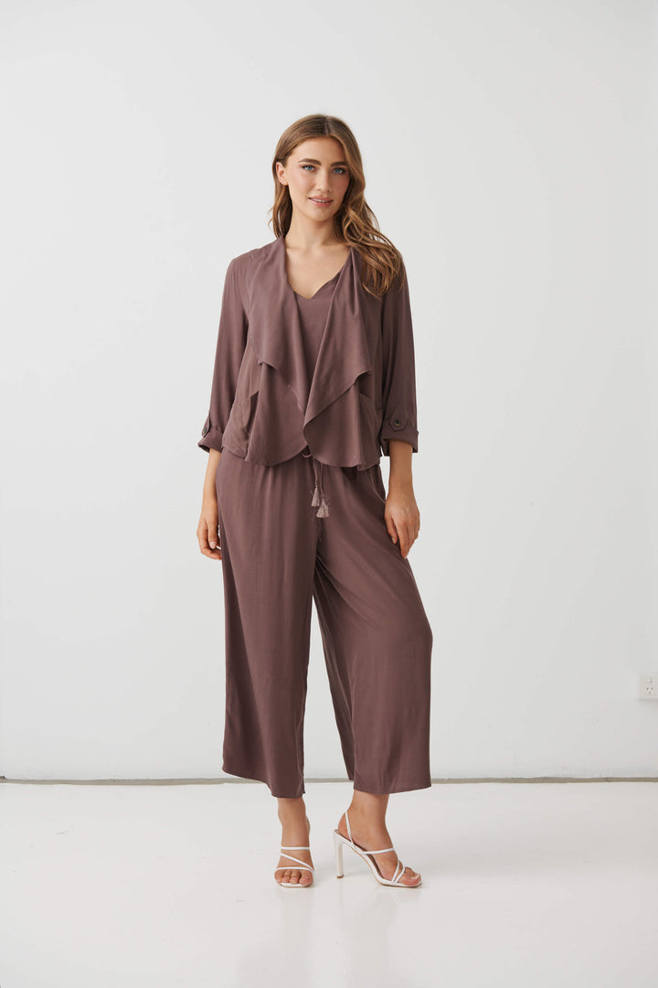 Holmes &amp; Fallon Mocha back-zip feature jacket with layered ruffle front and V-neck underlayer. On a white studio background
