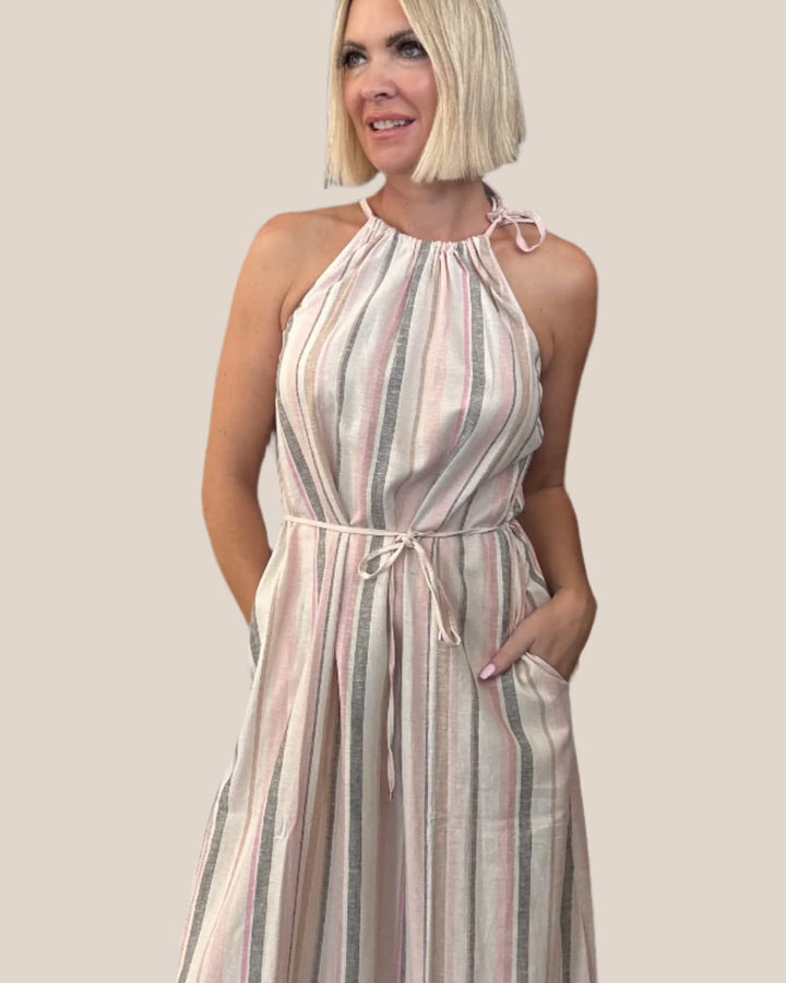 Women wearing a strip dress with a yellow background . Mos Mosh Adene Lino Dress at The Wardrobe