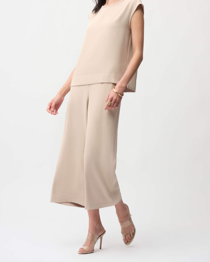 Joseph Ribkoff Parchment beige pull-on culotte pants, wide leg hem, ankle length. 
On a white studio background 