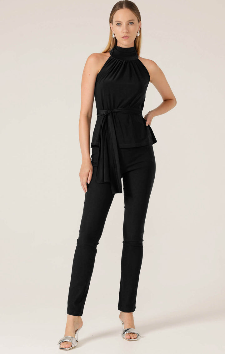 Black sleeveless high-neck tie waist top with draped side overlay