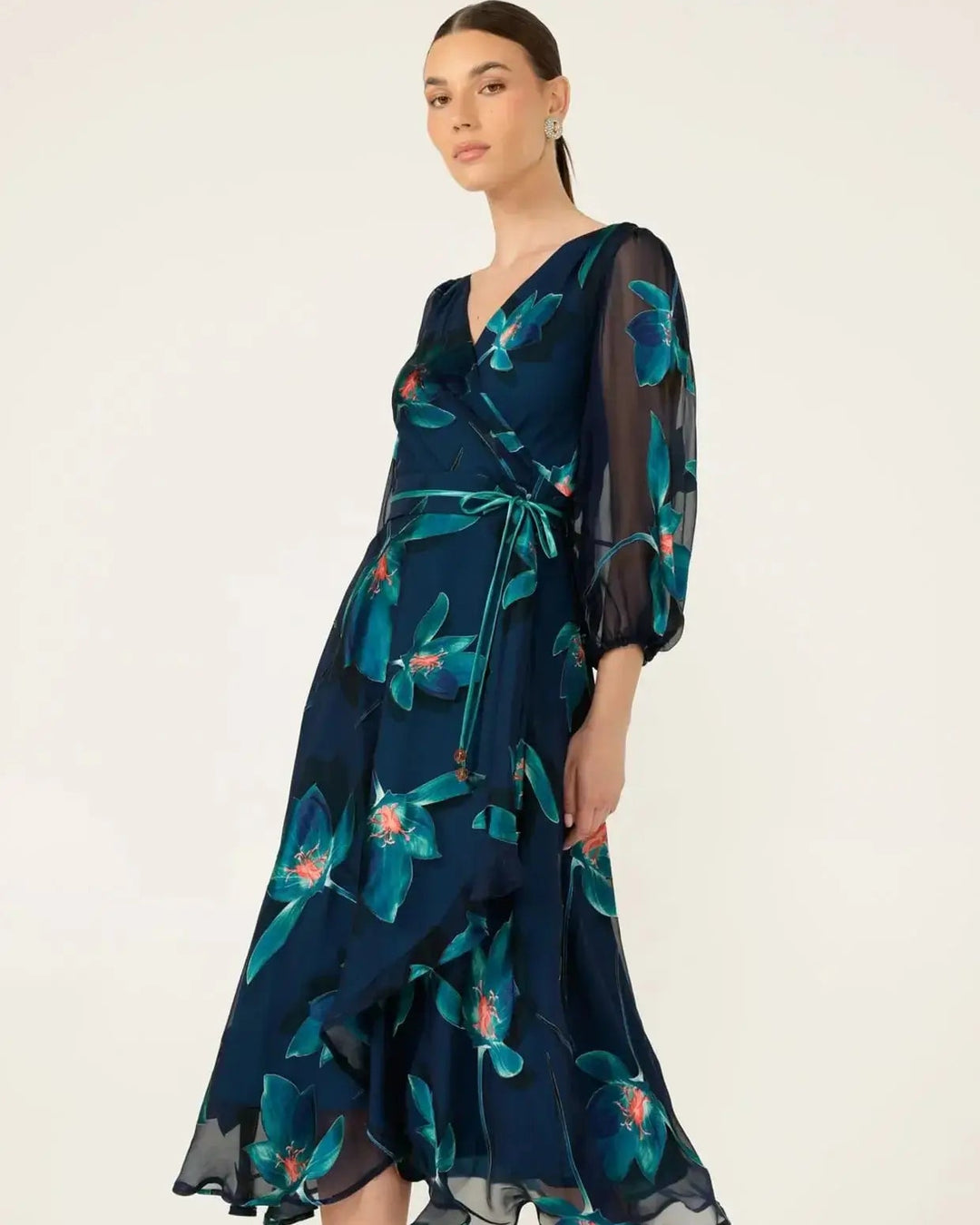 Navy wrap midi dress with teal floral print, V-neck and tie belt, sheer puff sleeves