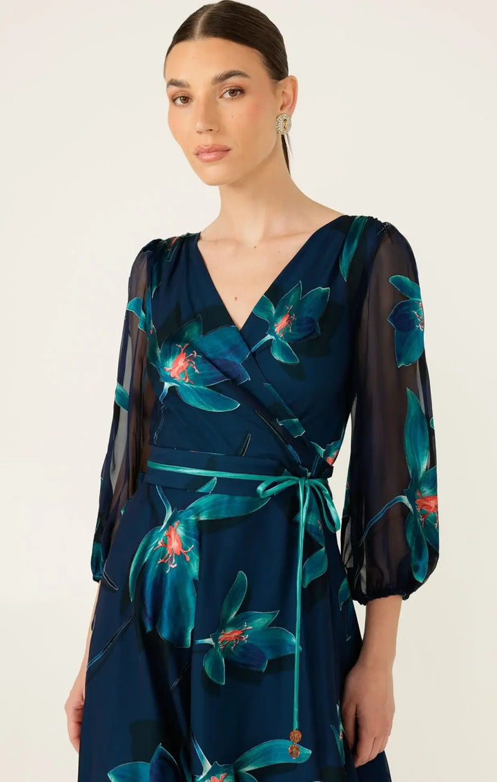 Navy wrap midi dress with teal floral print, V-neck, tie belt, sheer gathered 3/4 sleeves