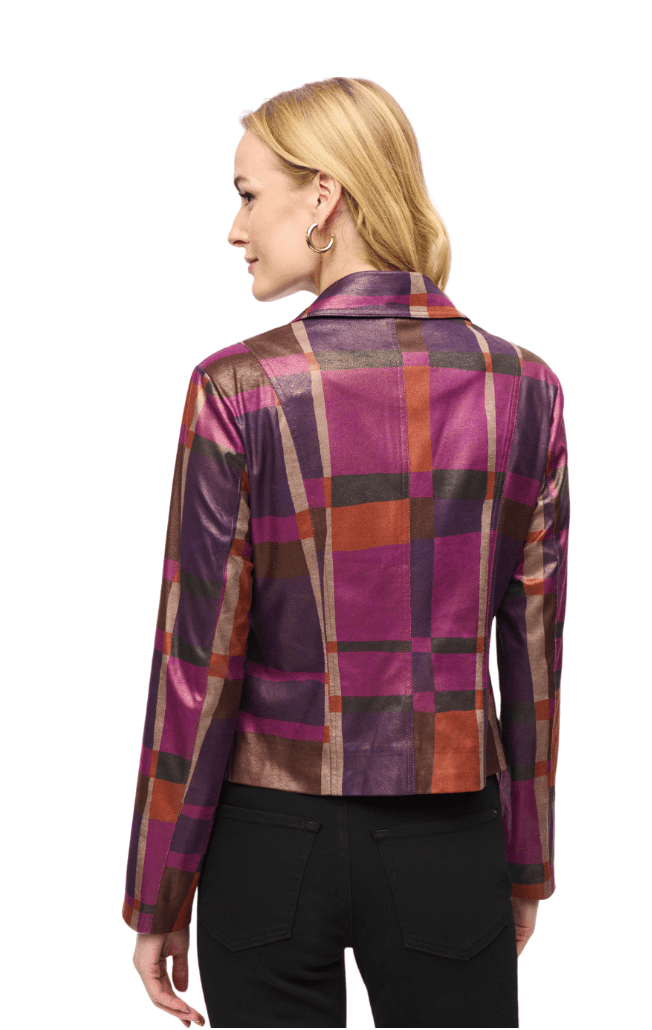 Woman wearing a plaid jacket with a white background