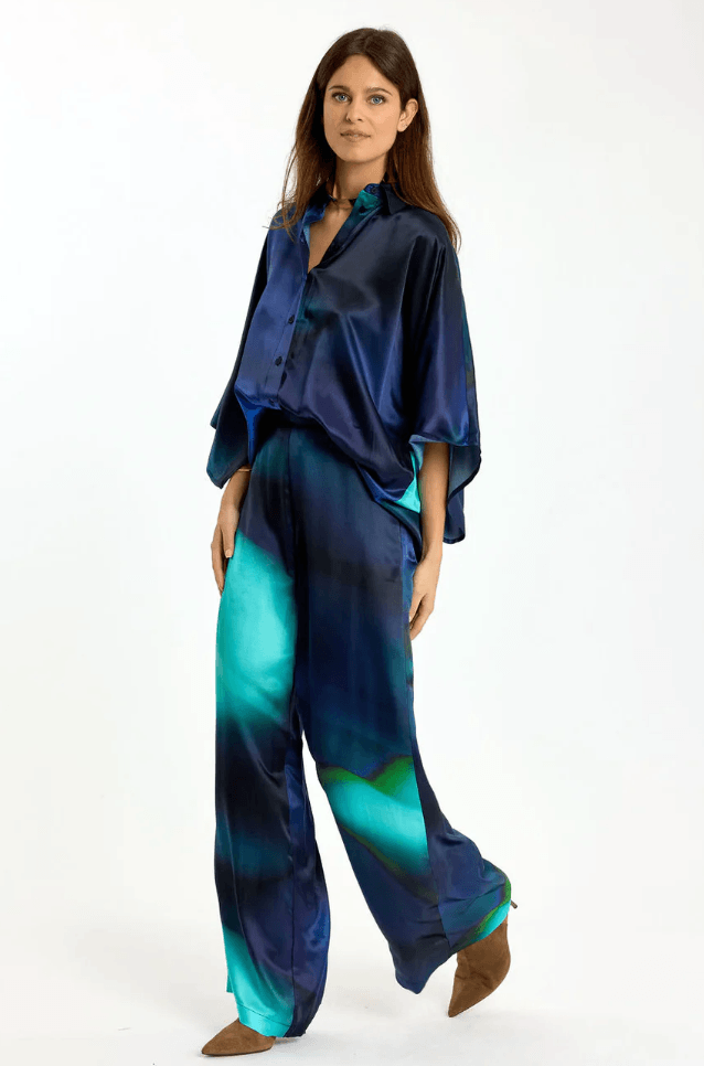 Navy blue and teal abstract print wide-leg trousers with flowy full-length legs