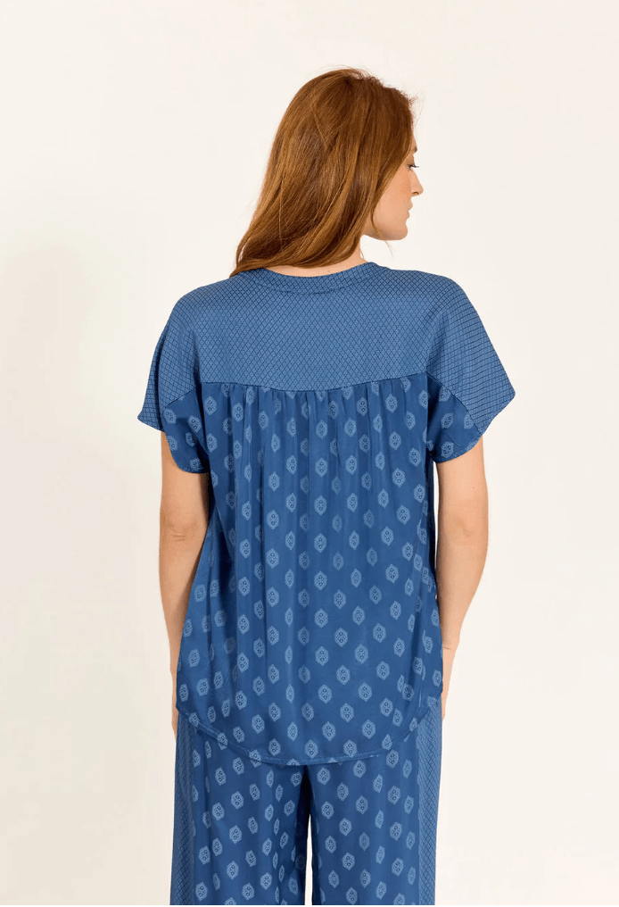 Lauren Vidal ocean-blue top with short sleeves, crew neck, geometric back pattern