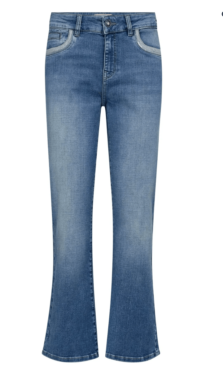 Mos Mosh model wearing medium-wash blue jeans with a blue long-sleeve button-up shirt, shown from the waist down against a light gray studio background. Flat image 