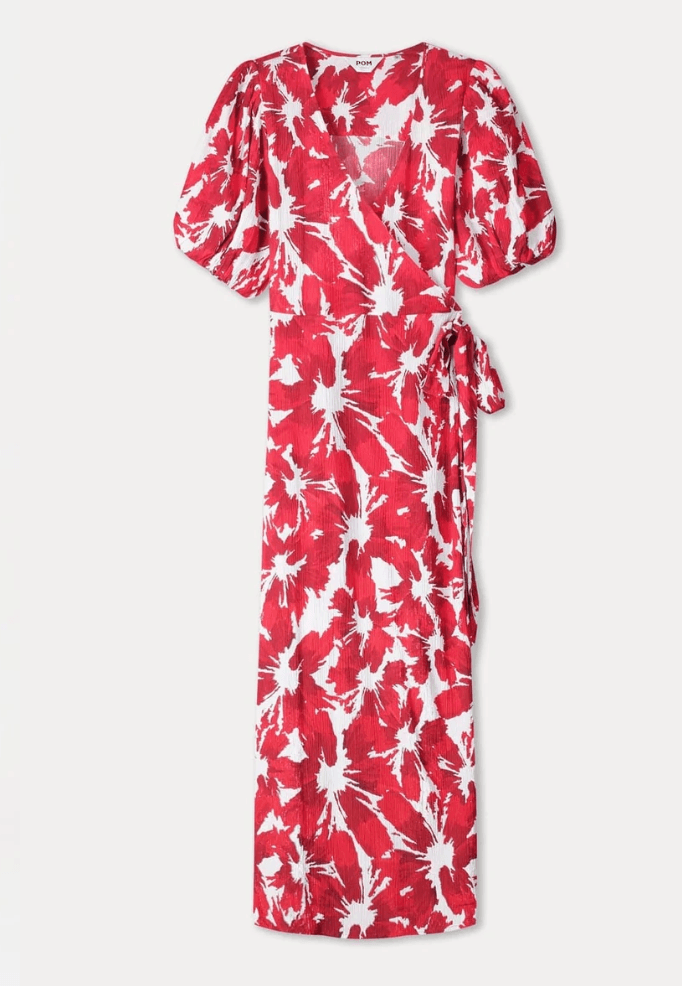 Pom Amsterdam a red and white abstract floral print midi dress with puff sleeves and a V-neckline, paired with red heeled sandals against a plain white studio background. Flat image.
