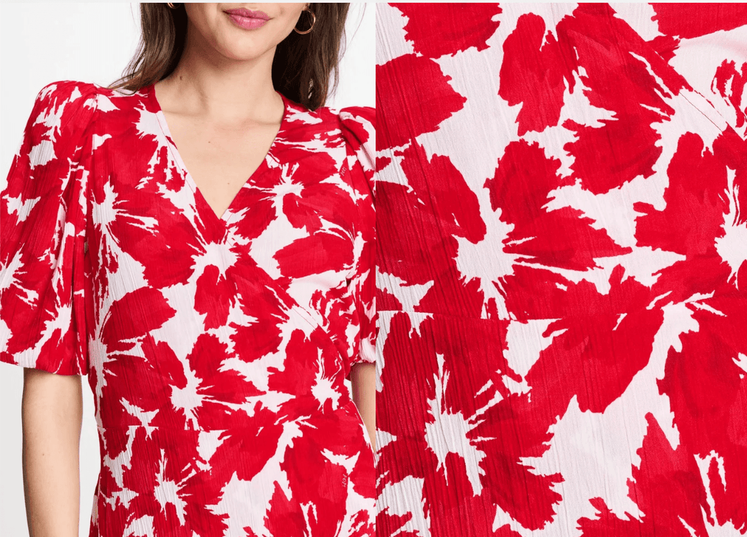 Pom Amsterdam. A woman wearing a red and white floral print wrap-style top, with a close-up inset of the fabric pattern on the right side.