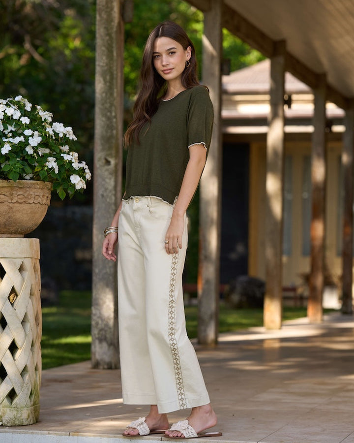 Women’s ecru wide-leg pants with vertical embroidered side panel
