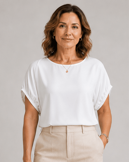 White short-sleeve blouse top with draped shoulders and rounded neckline